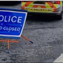 PSNI sign road closed.