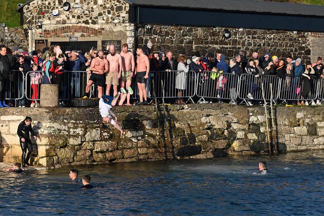 There was a good crowd of supporters for those taking part in the annual New Year's Day swim in Carnlough.