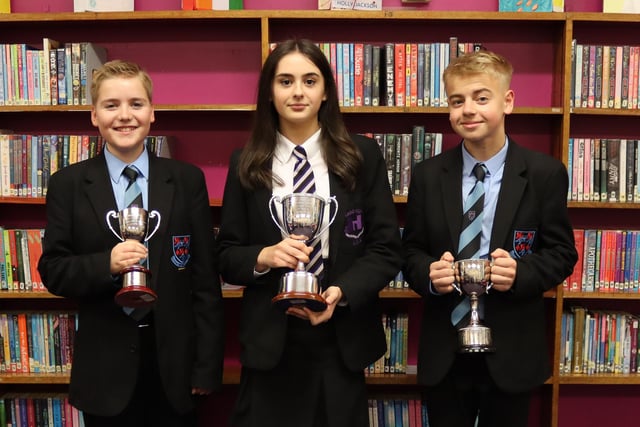 Tandragee Junior High School pupils Noah Jones, Amber Purdy and Lee McClellend who won trophies for  Academic Achievement and Excellence.
