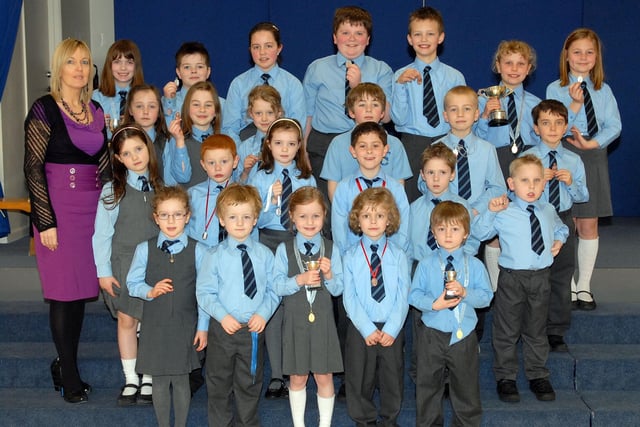 The Waringstown Primary School pupils who gained first, second and third places at the Portadown Speech and Drama Festival in 2010. With them is teacher Mrs Jill Usher.