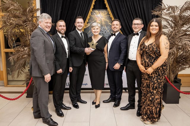Habitat for Humanity Restore won the Best Social Enterprise Business Award, sponsored by Haslem Hotel.  Niall Burns presented the award to the local Habitat for Humanity team
