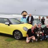 Pictured from left to right are sponsors Ellie Hodges, Holly Hasson and Jack Cassidy (JKC Mini) and Daniela Morelli (Morellis ice cream) with club and committee members represented by Stuart, Karen,  Mel , Jonny and Stephen of Causeway Coast Mini Club. Credit McAuley Multimedia