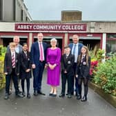 Education Minister Paul Givan MLA alongside Mrs Maria Quinn (Abbey Community College Principal), pupils and Westminster election candidates Sammy Wilson and Paul Girvan. (Pic: Contributed).