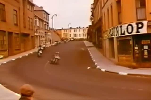 A still from the vintage footage of the 1958 North West 200 which was posted by the social media site Visit Portstewart, showing the race coming down onto Portstewart Prom. CREDIT VISIT PORTSTEWART