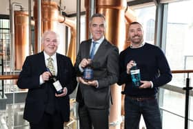 Belfast whiskey and gin distillery, Hinch Distillery has announced a partnership with local actor and producer, James Nesbitt.. Pictured are founder of Hinch Distillery, Dr Terry Cross OBE with his son, Patrick Cross, and James Nesbitt. Credit: Press Eye Ltd
