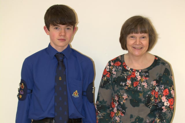 Philip Gilmore receiving his President's Badge from  his mum Isobel
