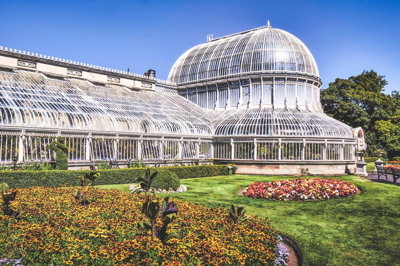Established nearly 200 years ago in 1828 by the Belfast Botanic and Horticultural Society, the capital’s Botanic Gardens are filled with short walks and paths through the site.
Filled with beautiful flowers and plants, historic architectural buildings and more, it’s a must-visit when in Belfast.