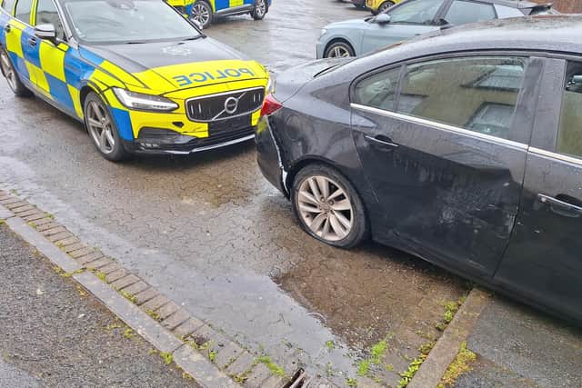 PSNI officers injured and multiple vehicles damaged following a police chase after a stolen car was spotted in Moira and ended in Lurgan, Co Armagh.