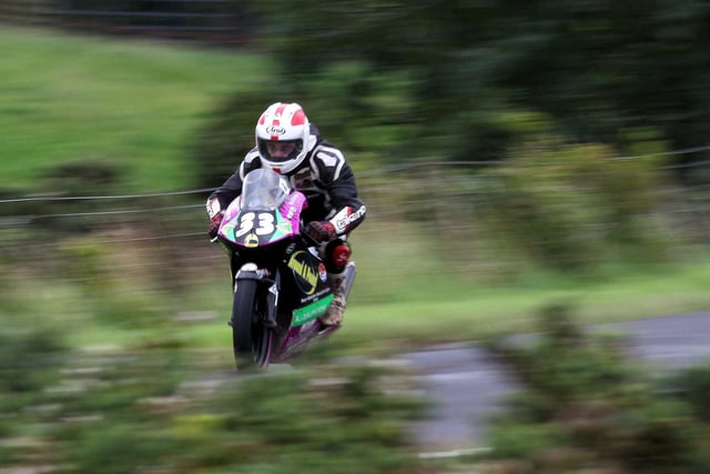 Sam Dunlop in action on race day around the Armoy Circuit on his 125cc in 2010