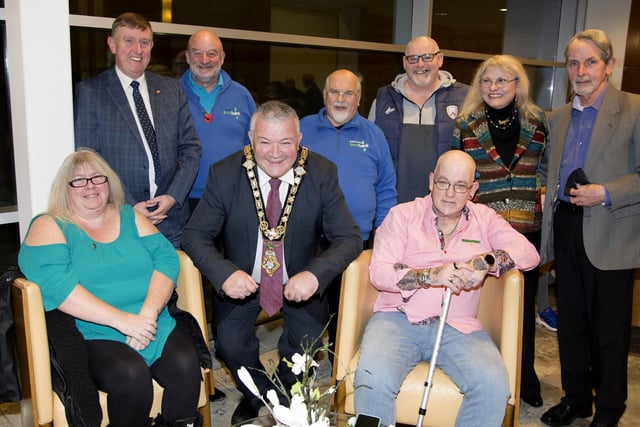 The Mayor of Causeway Coast and Glens Borough Council Councillor Ivor Wallace pictured with some of those from the Vineyard who attended the event in Cloonavin to recognise the work of local Food Banks and Christians Against Poverty.