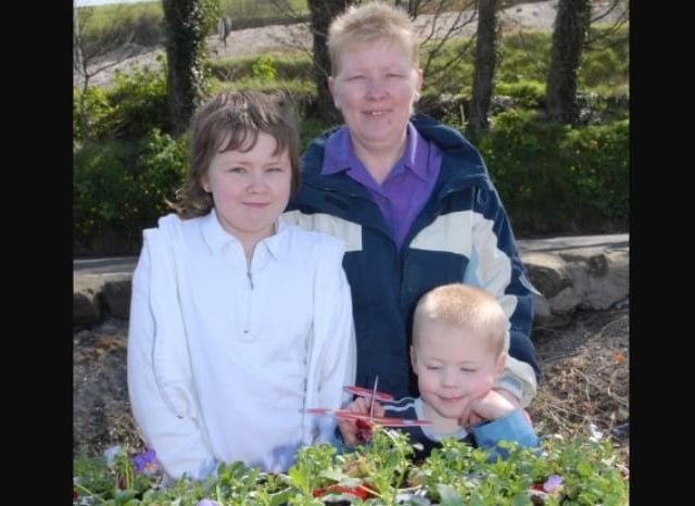 Emma, Scott and Philomena Robinson sold plants grown by Glenarm Youth Club during the fun day at the harbour on Easter Monday 2007.