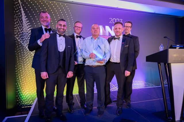 Tarvinder Katavada, EWI Sales Specification Manager and Scott Bradshaw, National EWI Specification Manager at K Systems accept the award for High Rise Refurbishment Render Finish at the prestigious INCA Awards in Nottingham.  Photo: Chris Towlson