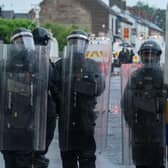 Riot police on duty in West Street.