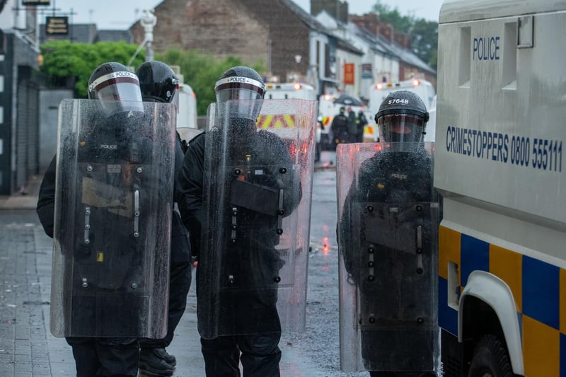Riot police on duty in West Street.