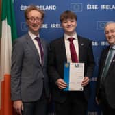 Ewan McNally receiving his Rotary Youth Leadership Development Competition award from Fearghas Ó Béara, Head of European Parliament Liaison Office in Ireland and Michael Fleming, District Governor of Rotary Ireland, at an event at Europe House in Dublin. Picture: Ger Holland Photography
