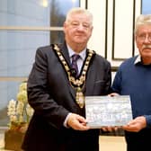 The Mayor of Causeway Coast and Glens, Councillor Steven Callaghan pictured with Derek McIntyre who was recognised at a recent reception in Council’s Civic Headquarters. Credit Causeway Coast and Glens Council