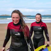 Lifeguards Ola and Toni carrying out board training. Credit RNLI/Michael Jess