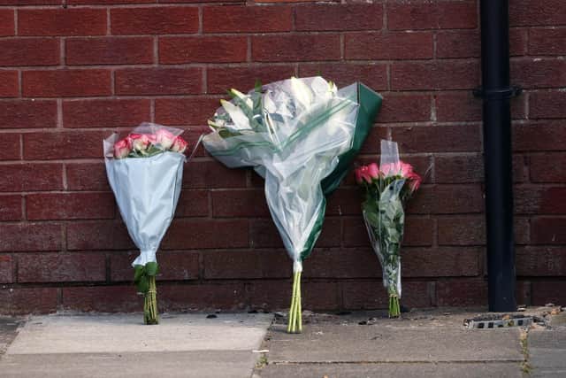 Flowers placed at James Street in Ballymena.  Picture: Peter Morrison/PressEye