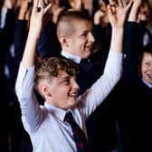 Smiles all around as pupils learn more about Ulster-Scots heritage.