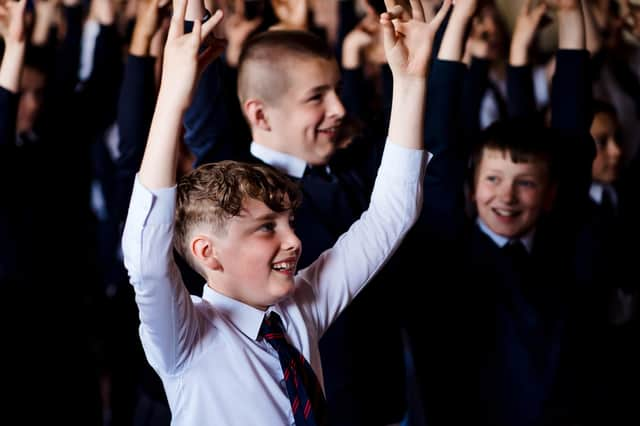 Smiles all around as pupils learn more about Ulster-Scots heritage.