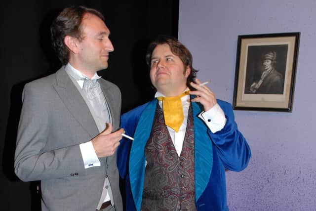 John Worthing (Colin Woodham) and Algernon Moncreiff (Stuart Wilson) deep in discussion during the Holywood Players performance of "The Importance of Being Earnest" at the Larne Drama Festival in 2012. Photo: Peter Rippon