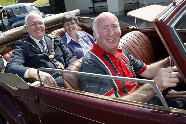 Will Browne drives the then Mayor of Coleraine, Councillor David Barbour and his wife Margaret in style during the Red Sails Festival parade through Portstewart in 2008.