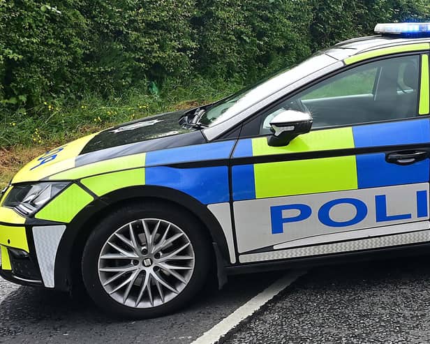 Road users are advised to avoid the Crossgar Road, Ballynahinch, as police and emergency services are currently at the scene of a one vehicle road traffic collision. Picture: Pacemaker (stock image).