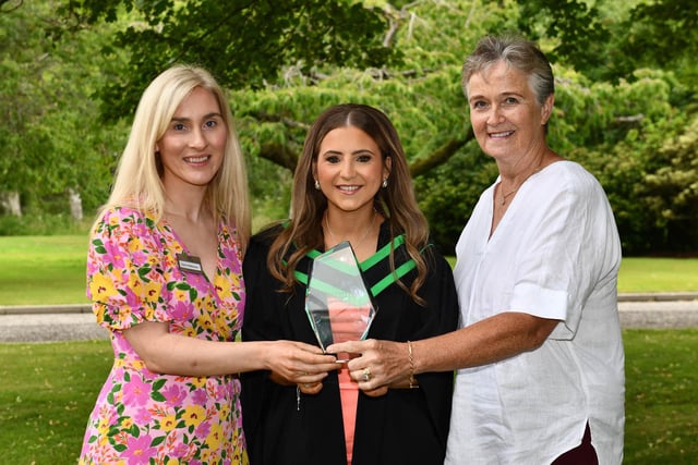 Holly Brown from Moneymore graduated with a First Class Honours Degree in Food Innovation and Nutrition at the Graduation Ceremony at CAFRE. Holly was awarded with the Food Standards Agency Prize for achieving the highest marks in the Food and Nutrition final year module. Congratulating Holly are Dr Elaine McMackin (Lecturer, CAFRE) and Roberta Ferson (Head of Corporate Services and Strategic Engagement, FSA NI).