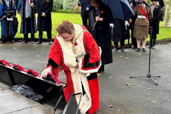 Mayor of Mid and East Antrim, Alderman Gerardine Mulvenna lays a poppy wreath at the Remembrance service.  Photo: Mid and East Antrim Borough Council