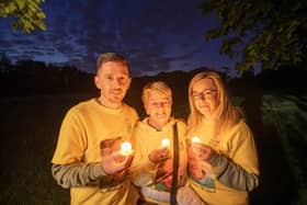 Michael, Elizabeth and Claire McGuinness, North Belfast at Darkness into Light, Ormeau Park