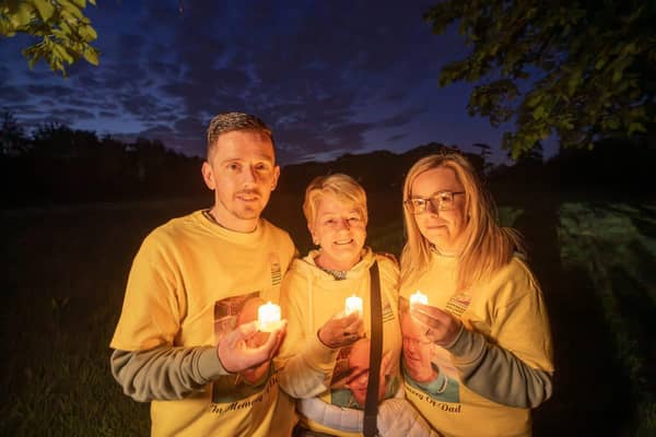 Michael, Elizabeth and Claire McGuinness, North Belfast at Darkness into Light, Ormeau Park