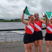 Pictured are Irish Champions Flynn Greene, Katie Shirlow and Alex Hutchinson along with Bann Rowing Club head coach Geoff Bones. Credit: Bann Rowing Club