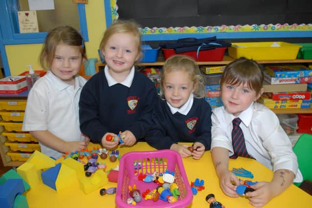 Gracie, Lori, Alex and Cyan building castles with blocks in Mrs McKay's P1 classroom at Moyle Primary School in 2011. INLT 38-309-PR Photo: Peter Rippon