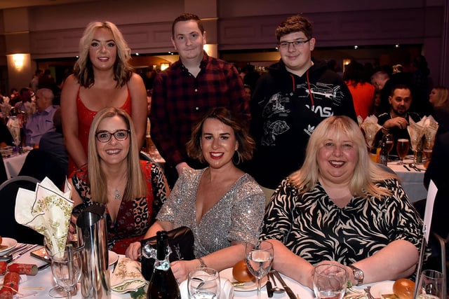 Celebrating the season at Seagoe Hotel Christmas Party Night on Saturday night are staff from Porter's Bodyshop, Portadown. PT51-280.