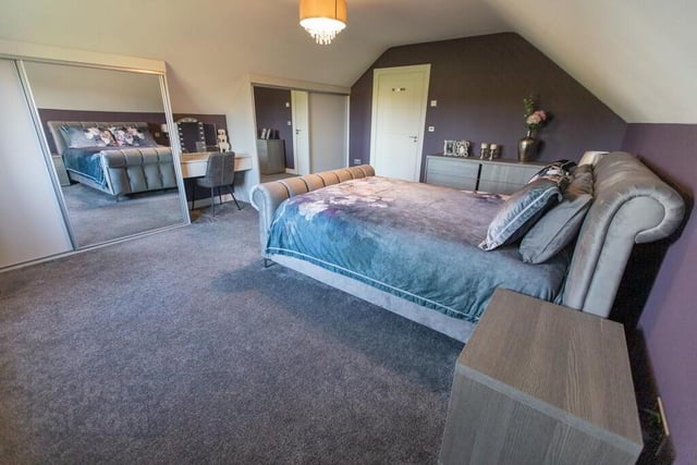 One of two spacious bedrooms on the first floor of this impressive chalet bungalow.