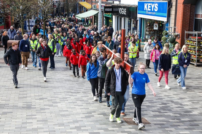 A cross was carried through Lisburn City Centre for the annual Walk of Witness on Good Friday