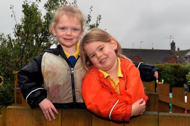 Edenderry Nursery School pupils, Lucy and Elena taking a moment to pose for the camera. PT43-314.