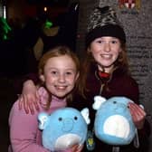 Excited to see the Christmas lights switch on in Portadown town centre in 2022 are friends Mia Fearon, left, and Clodagh Smith, both aged 10.  Photo: Tony Hendron