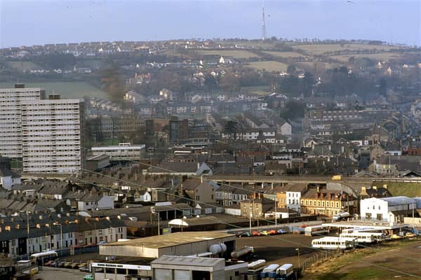 A view of the town in the early 1980s, showing two of the three blocks of flats at Riverdale.  Gardenmore House and Shane House have since been demolished with the remaining block, Latharna House soon to follow.