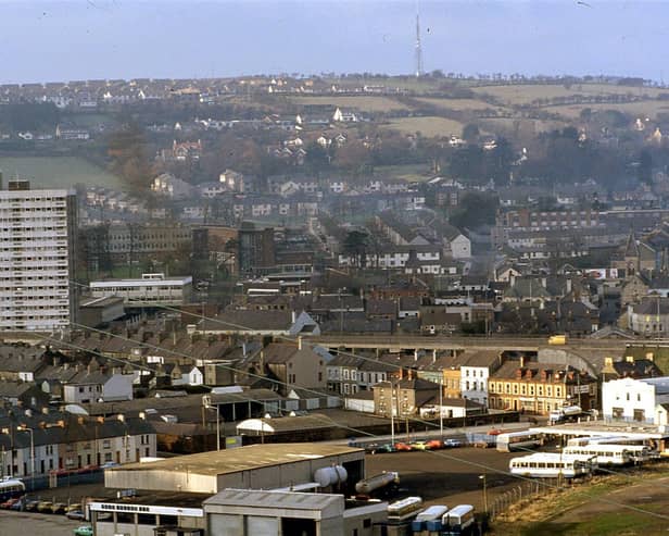 A view of the town in the early 1980s, showing two of the three blocks of flats at Riverdale.  Gardenmore House and Shane House have since been demolished with the remaining block, Latharna House soon to follow.