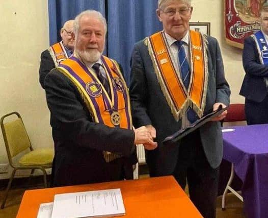 At last Monday's installation of officers meeting, Bro Mervyn Calvin was presented with a bar and a certificate to commemorate 60 years of membership. He is pictured with Raymond Rodgers, County Grand Tyler