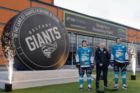 Mike Lee, defenceman, Belfast Giants, Martin McDowell, chair, The Odyssey Trust, Joe Cassetti, forward, Belfast Giants, at the unveiling of the puck sculpture at The SSE Arena, Belfast. Picture: Philip Magowan