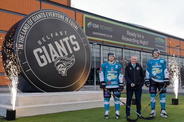 Mike Lee, defenceman, Belfast Giants, Martin McDowell, chair, The Odyssey Trust, Joe Cassetti, forward, Belfast Giants, at the unveiling of the puck sculpture at The SSE Arena, Belfast. Picture: Philip Magowan