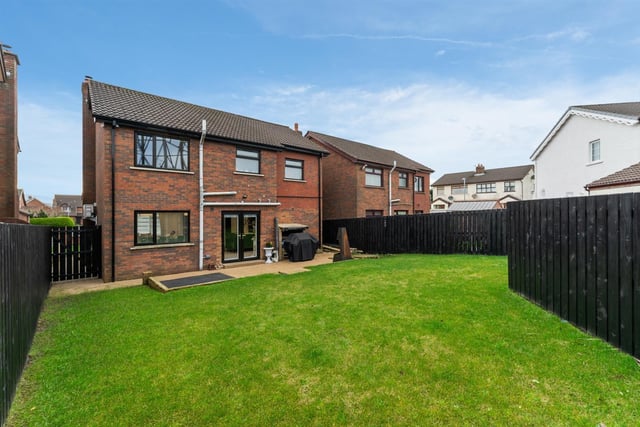 Fully enclosed rear garden, finished in lawn and resin patio area.