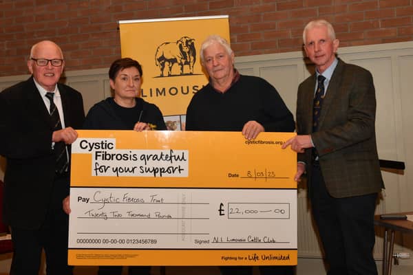 Jim Quail, Club President, Ian Davidson Snr and Brian McAuley, Club Chairman presented a cheque for £22,000 to Mary MacFarlane of the Cystic Fibrosis Trust at the Clubs AGM.