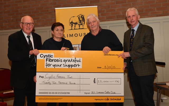 Jim Quail, Club President, Ian Davidson Snr and Brian McAuley, Club Chairman presented a cheque for £22,000 to Mary MacFarlane of the Cystic Fibrosis Trust at the Clubs AGM.