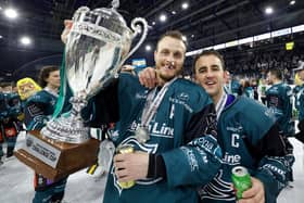 Belfast Giants’ Mark Cooper and David Goodwin celebrate after defeating the Fife Flyers to win the Challenge Cup Final at the SSE Arena, Belfast.  Photo by William Cherry/Presseye