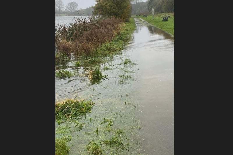 Pathway and lake merge during large scale flooding at Craigavon City Park and Lakes.