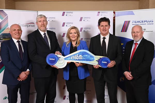 Rail services between Belfast and Dublin are set to benefit from a €165million (£141.9million) investment from the PEACEPLUS Programme. Pictured (left-right) are Ian Campbell, director of service operations, Translink; Intrastructure Minister John O’Dowd; Gina McIntyre, CEO SEUPB; Irish Transport Minister Eamon Ryan, and Billy Gilpin, director of train operations, Iarnród Éireann. Picture: Michael Cooper