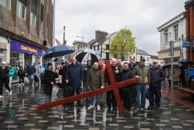 A poignant service was held at First Lisburn Presbyterian Church after the cross was carried up Bow Street